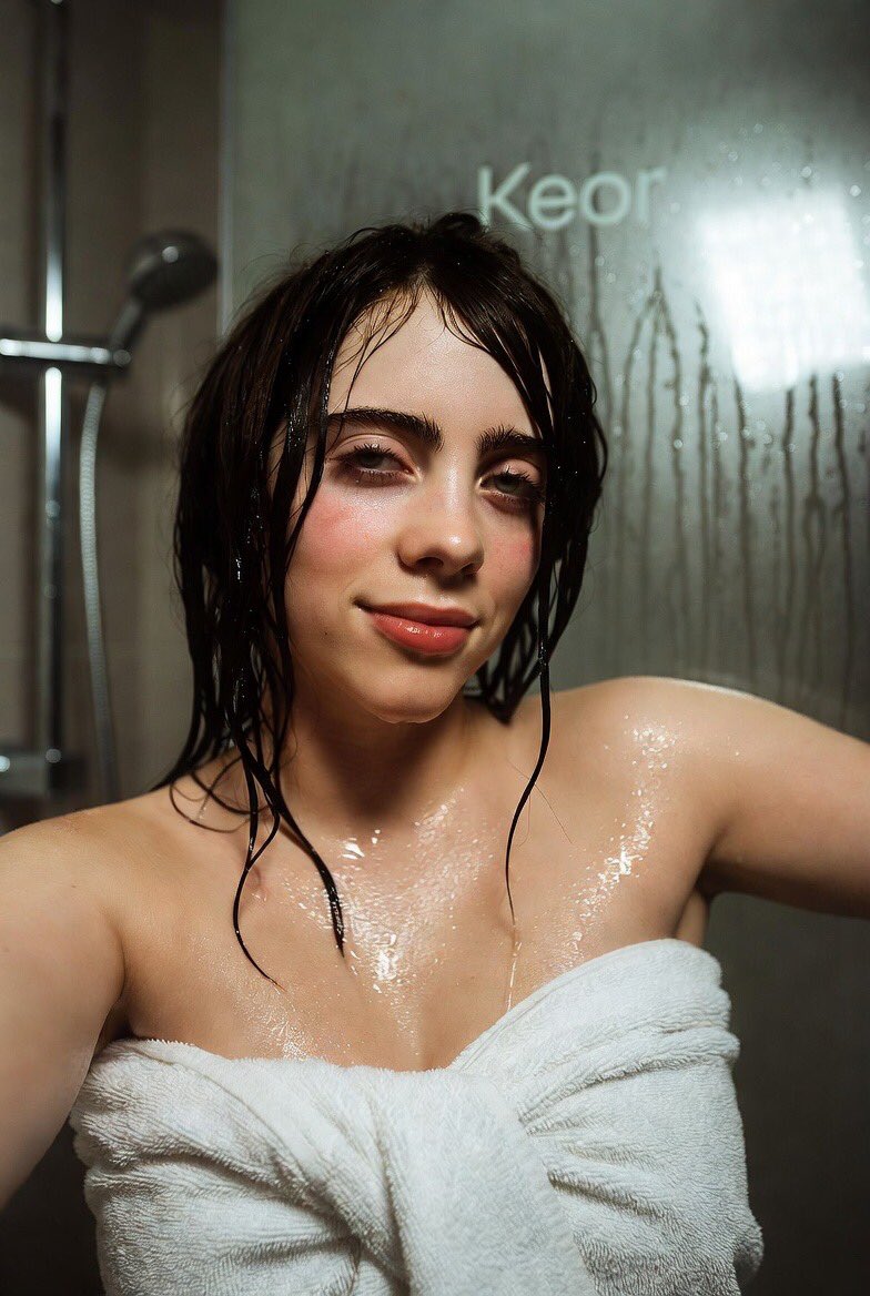 { "subject": { "identity": { "likeness_calibration": "Billie Eilish", "facial_features"…