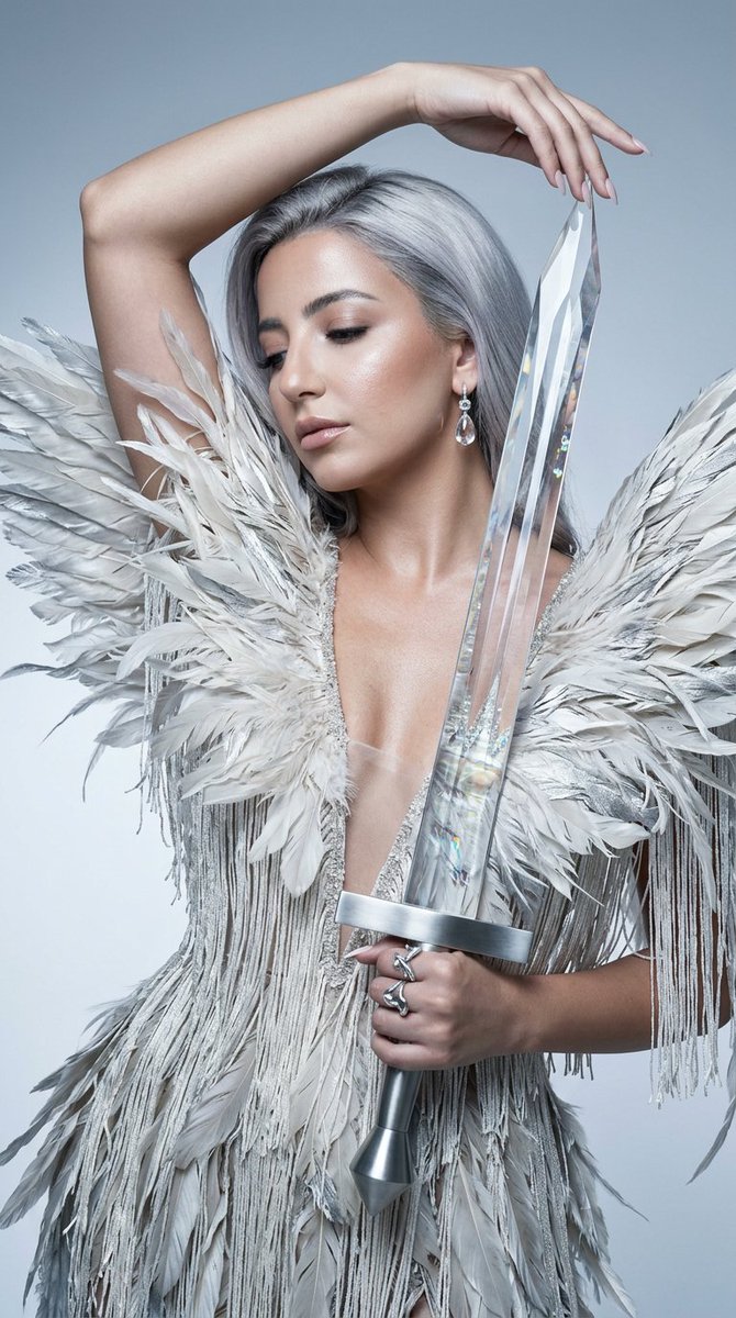 { "concept": "alabaster_blade_light_angel_portrait", "variant_of": "obsidian_bl…