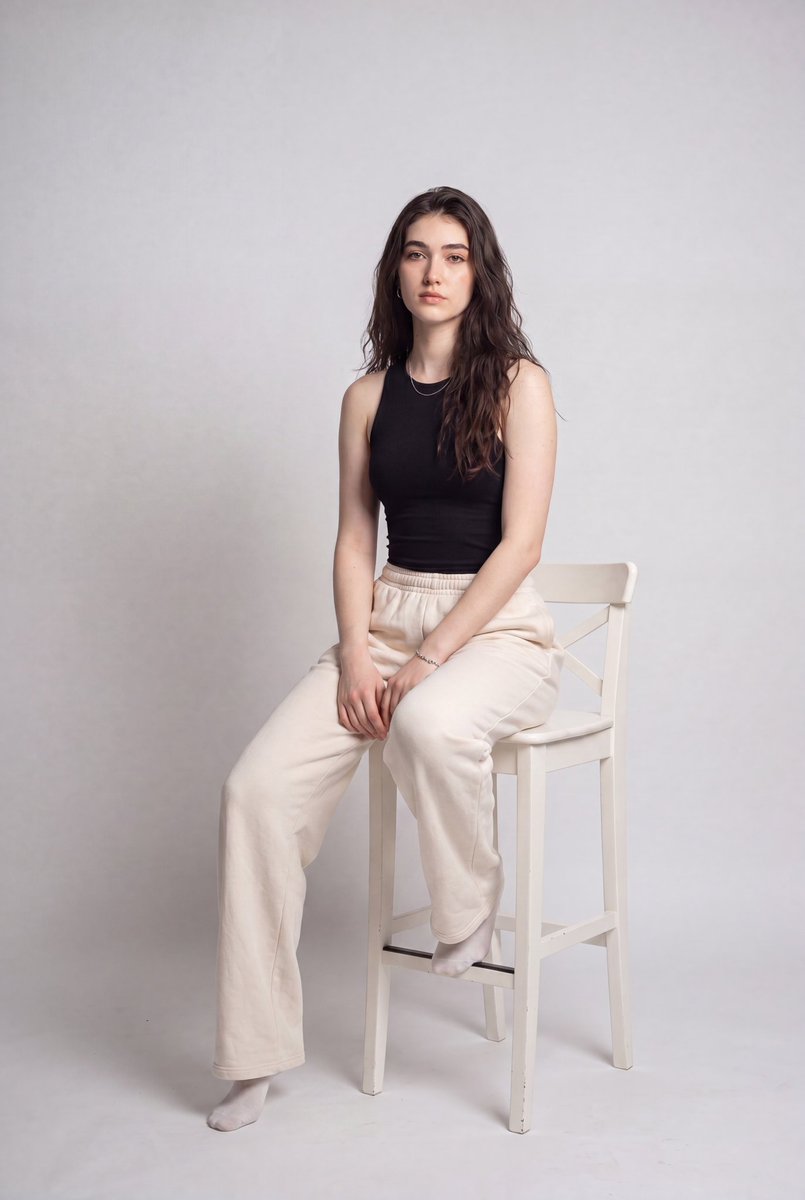 {"image_type":"studio_fashion_portrait","genre":"minimalist_editorial","composition":{"or…