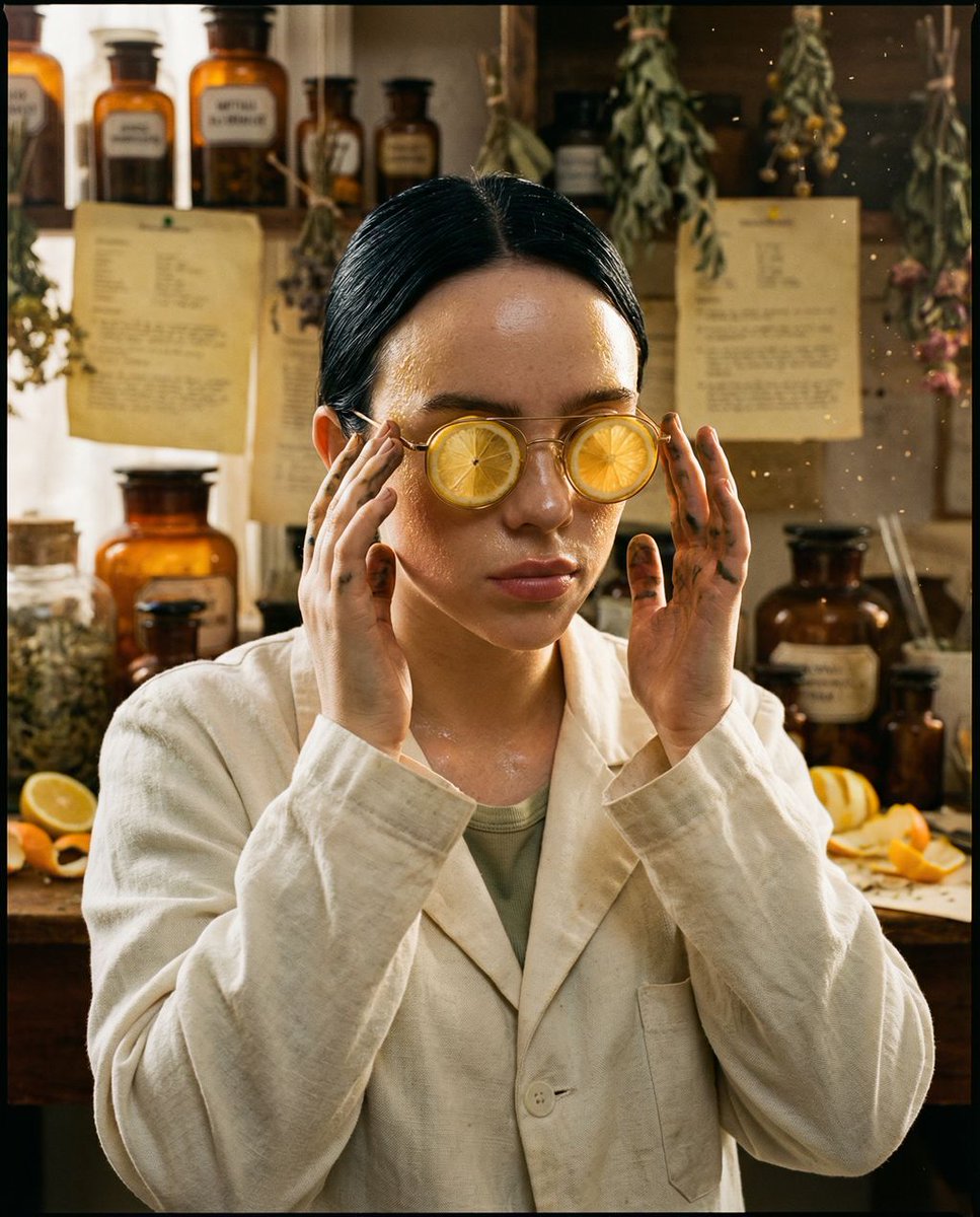 { "vibe_title_en": "The Acidic Alchemist", "master_prompt": "一张超现实、中画幅的人像照,主题为 The Melanc…