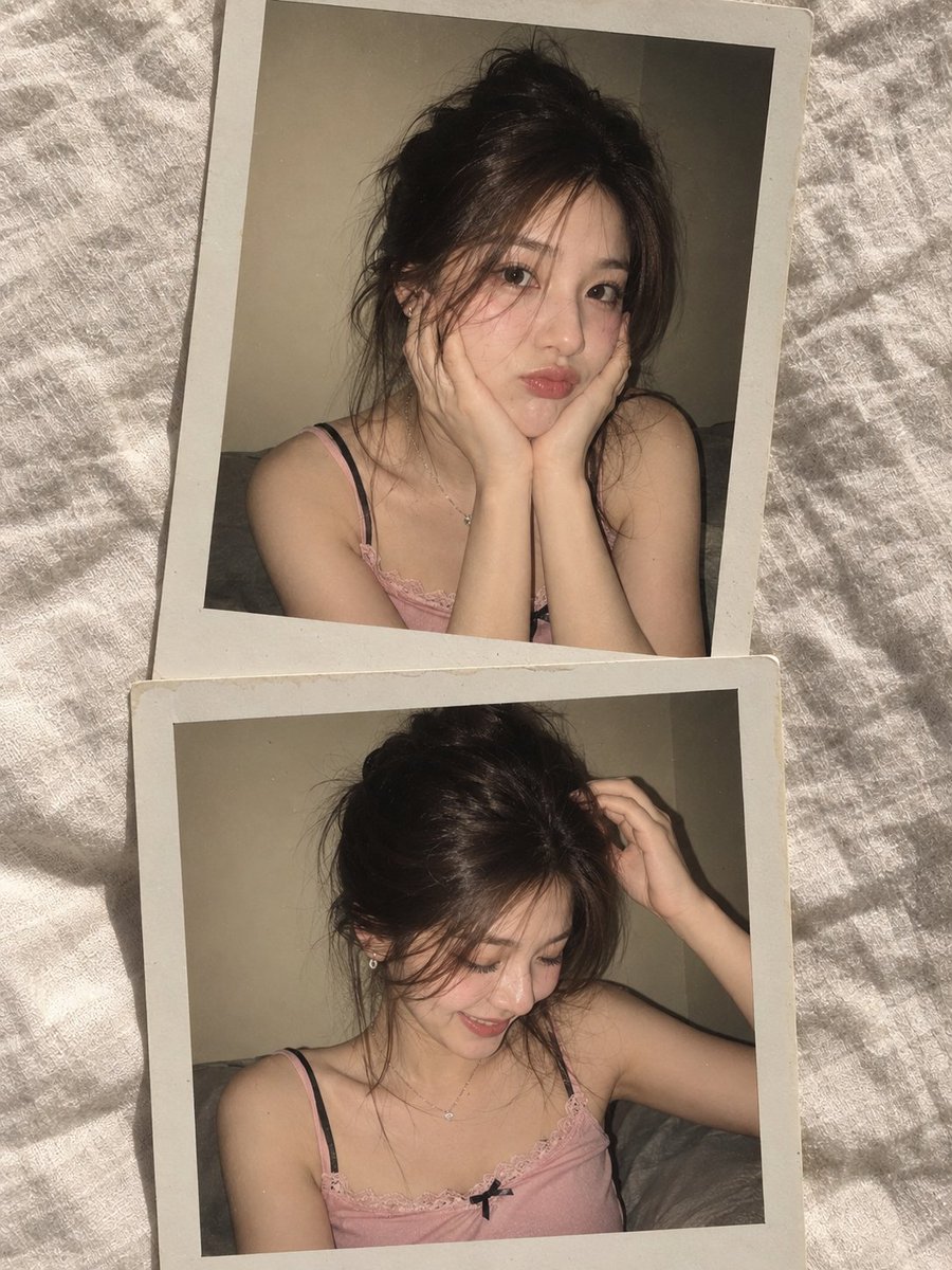 一张照片写实、编辑风格的双格拍立得拼贴，包含同一年轻女性的两张不同抓拍肖像。她有着深棕色头发，梳成松散略带凌乱的发髻，几缕柔软细丝垂在脸庞两侧，眼神为温暖的棕…