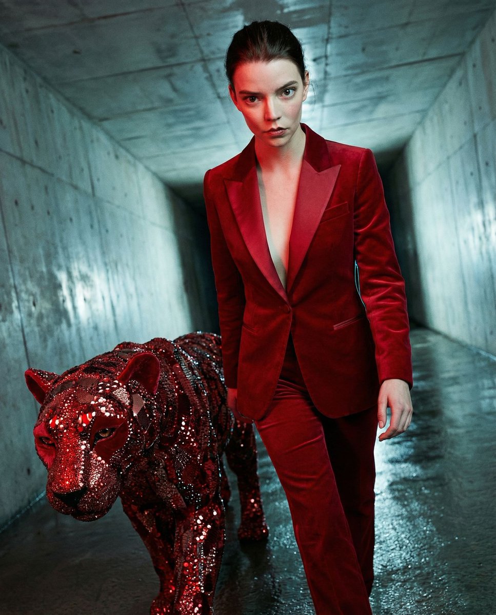 { "vibe_title_en": "Ruby Resolve", "master_prompt": "A hyper-realistic, avant-garde fashi…